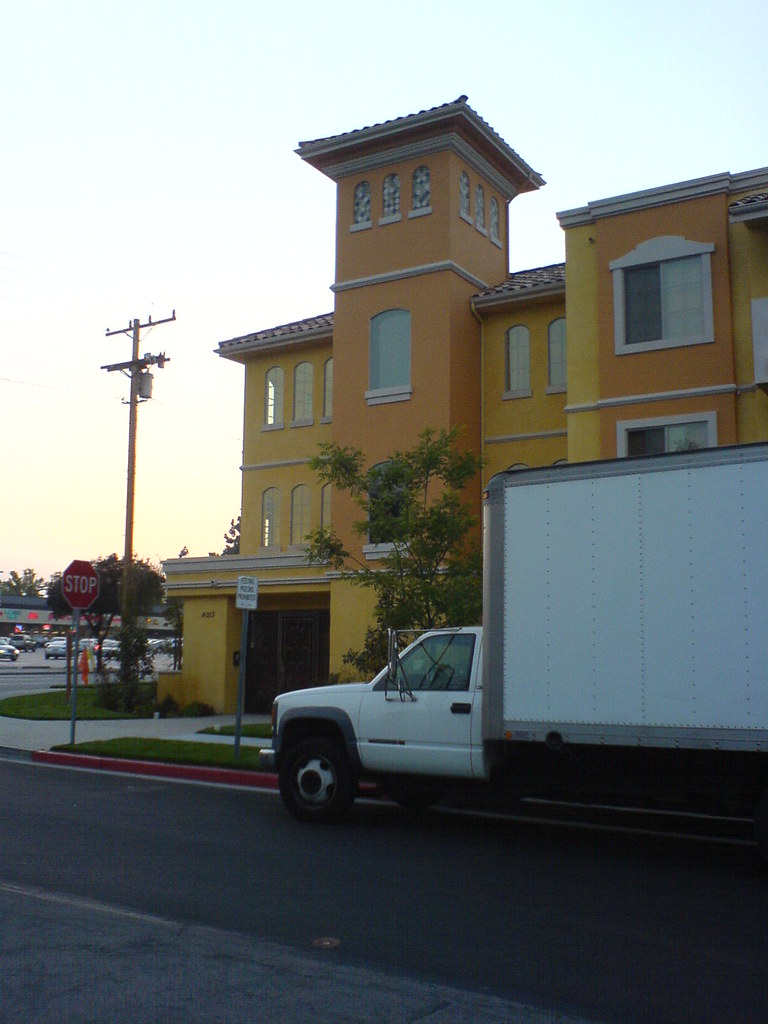 Our small rental car outside our new apartment block