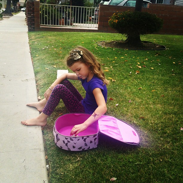 Boo is busking.